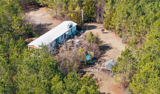 Livable trailer conveys with the land.