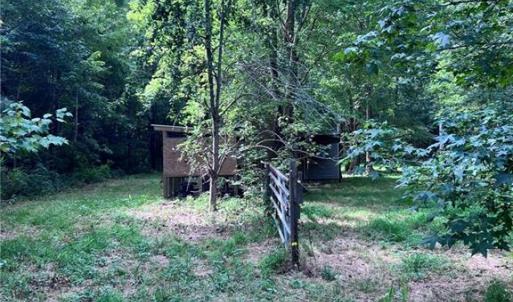 Trails to both buildings.