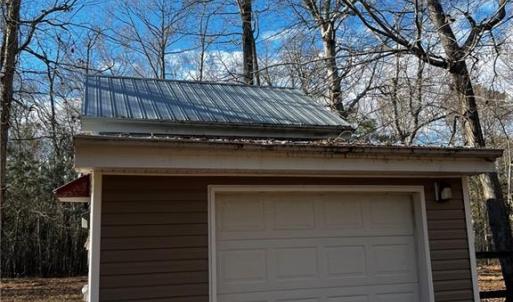 Utility shed with agricultural well and on stall horse barn.