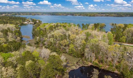 Aerial view walk over French Creek, rear of lot fronting creek to left of walk