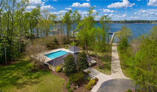 View of pool, boat ramp and dock