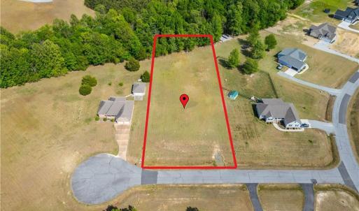 Set in a private cul-de-sac. Lot lines are approximated on photo, but are clearly marked with flags on the property.