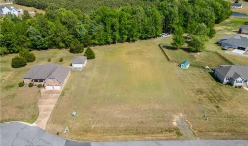 Trees line the back of the property, creating additional privacy.