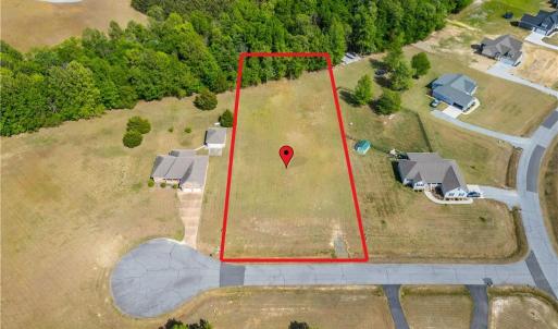 Set in a private cul-de-sac. Lot lines are approximated on photo, but are clearly marked with flags on the property.
