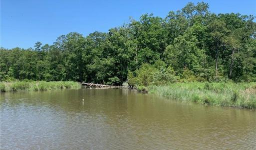 PHOTO FROM BOAT OF PROPERTY WATERFRONT