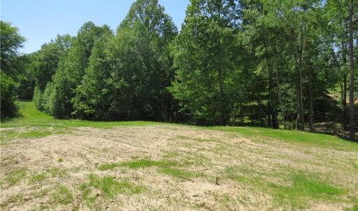 Driveway would be in the top left grassy area of this photo