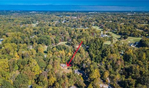 This .58 acre lot is located directly accross the street from the 4th green of the SCC golf course.