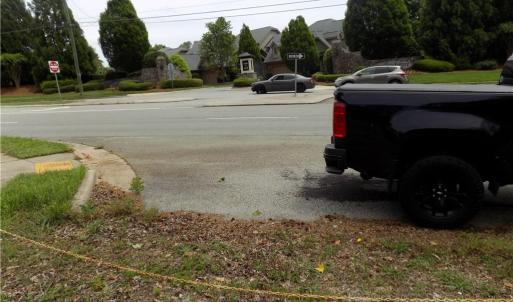 Curbing into turn in for property off New Garden Road
