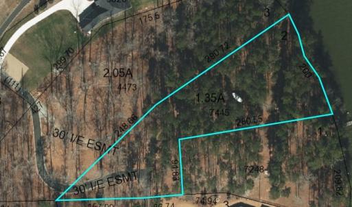 200 feet of waterfront beginning just to the right of the boathouse (boathouse not included).