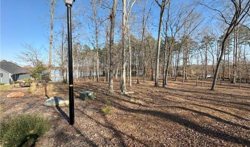 Just past the last home on the left, lot located straightaway and behind this pic.