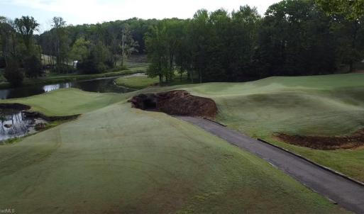 This lot offers views of the entire 12th hole land the 10th Green