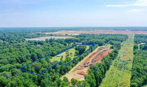 Approximate property lines drawn in blue.