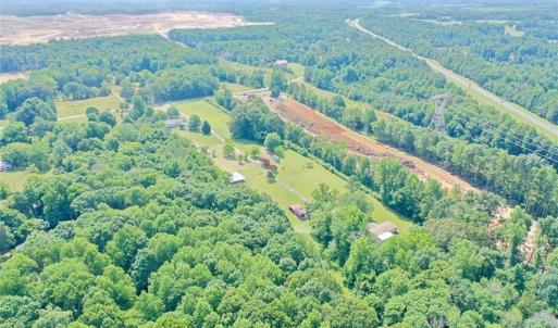 Hwy 421 (Future I-685) on far right of photo. NCDOT Interchange for Julian Airport Rd and TBMNC Campus North nearing completion. This road is unrecognizable now as opposed to the current photo.