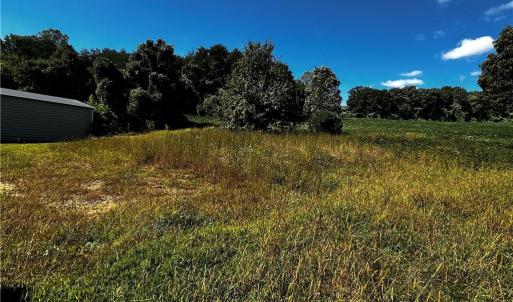 Metal building is on neighbors property