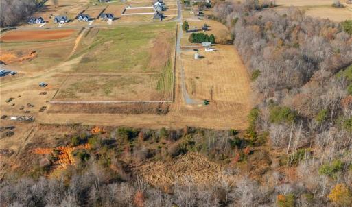 View from the back of the property. The white fence defines the property line while leaving open access for the pipeline easement