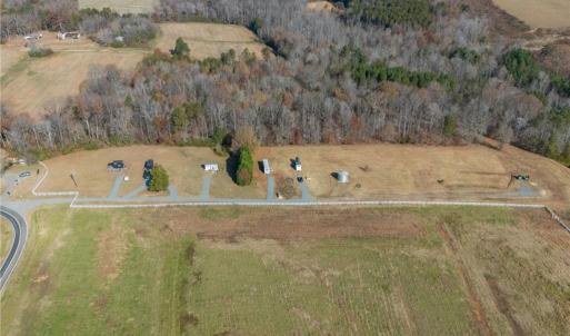 Little Bird Lane Private Rd with addresses for each lot. Site 3 is currently vacant. See Site Plan