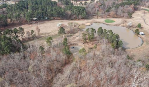 Aerial view of lot 54. Shows the 18th green and fairway in the upper portion of the photo.
