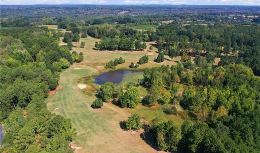 Aerial view of the lot 54 with the lake behind it.