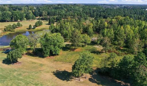Aerial view of Lot 54 Caswell Pines with the lake behind it.