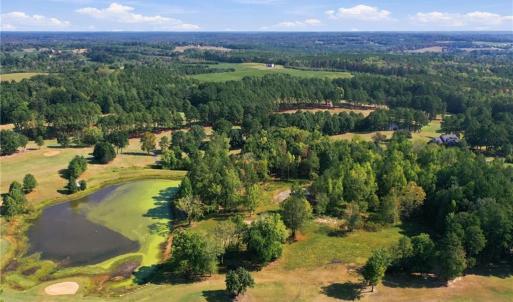 Aerial view of the 18th green and fairway, Lot 54 is in the middle of the photo at the back of the lake.