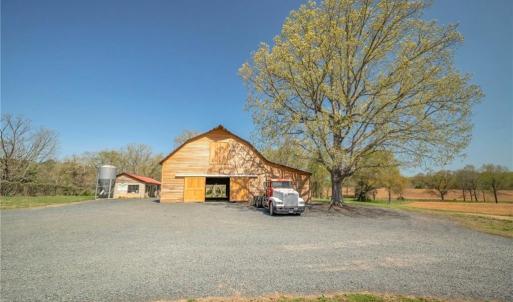 Re-sided cypress 13 stall barn with sliding doors