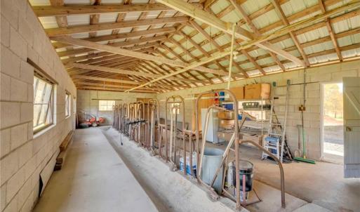 Concrete block milking parlor