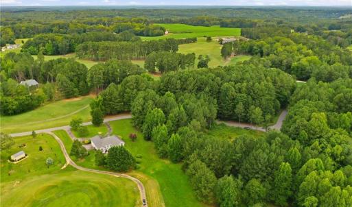 Aerial view of the property (lot 24) and 115 Oak Tree Drive.
