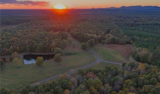 3 stocked fishing ponds, open pasture land, and wooded areas