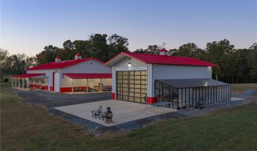 Recreational building w/ attached greenhouse, built by Morton Buildings, w/ 2 large glass garage doors, ideal for gardening/storage/ or recreational use