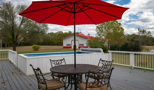 Large Trex style back deck, expansive entertaining space overlooking the farm
