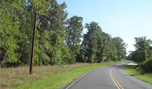 Viewing South along Garner Road.  The property is on the left.