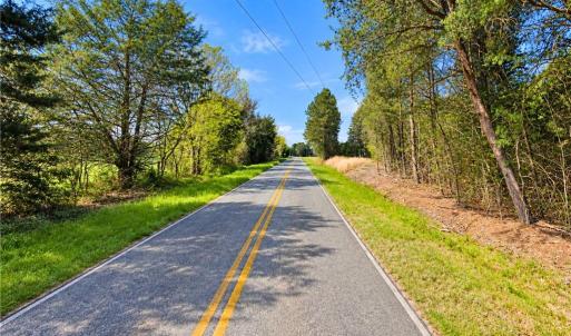 Paved Road Frontage Land Near Chapel Hill NC. Paved, state maintained road leading to the land. Easy year round access to wooded acreage in rural Orange County, NC, with power lines along the road.