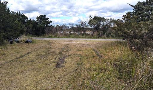 Front view w/back to pond