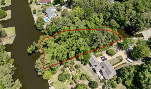 Water on 3 SIDES of lot!