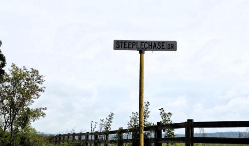 Across from entrance to Steeple Chase