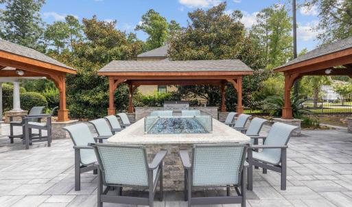 View of patio / terrace featuring an outdoor fire