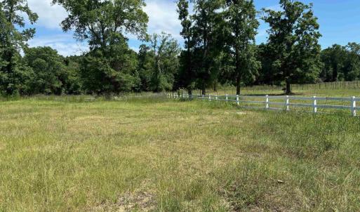 View of yard with a rural view