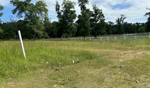 View of yard with a rural view