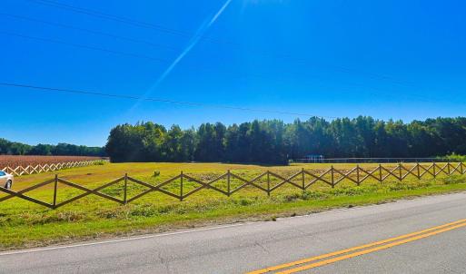 View of asphalt street with a rural view