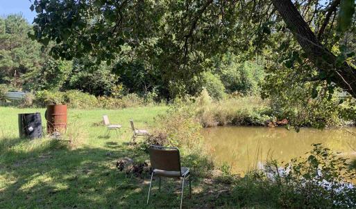 View of yard with a water view