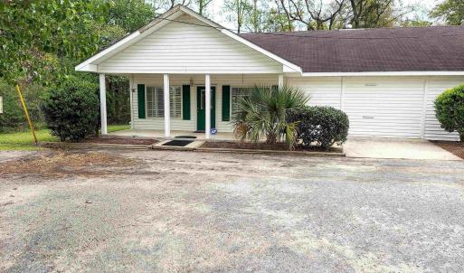 Single story home with covered porch