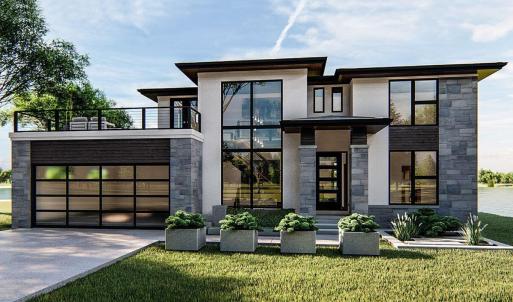 Contemporary house featuring a front yard and a ba