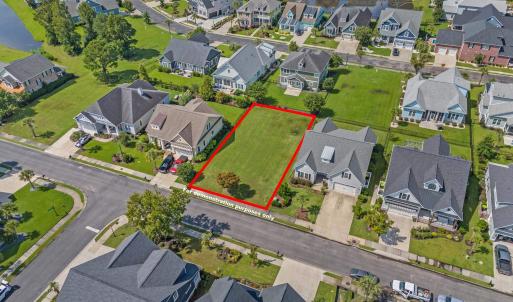 Aerial view of residential area featuring property