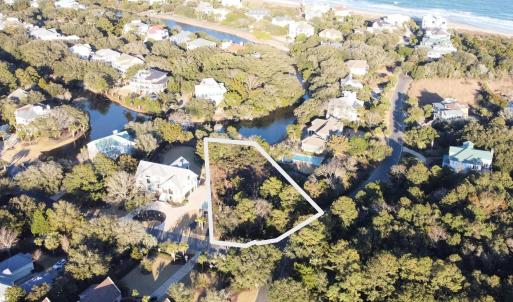 Drone / aerial view with a view of the beach and a