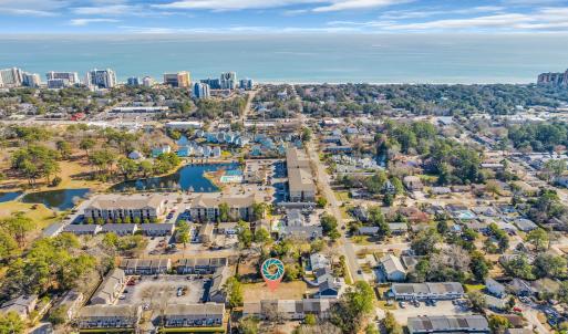 Birds eye view of property with a view of city and