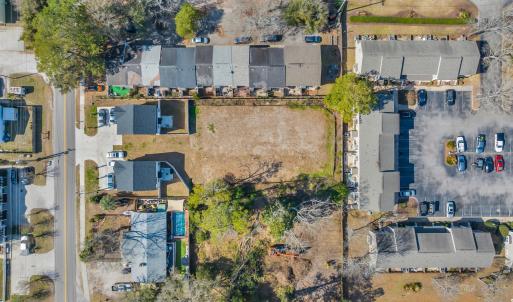 Birds eye view of property with a residential view