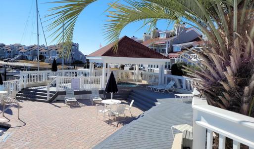 View of patio with fence