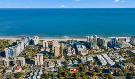 Bird's eye view with a water view and a view of ci