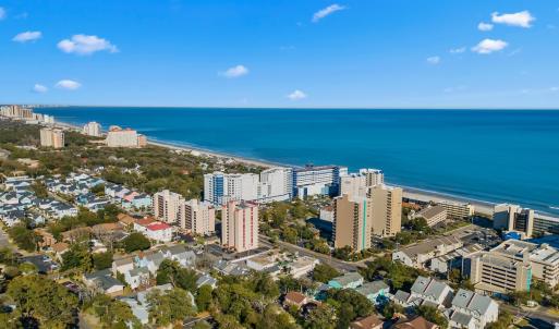 Bird's eye view with a city view and a water view