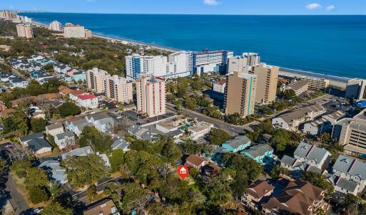 Aerial view with a view of the beach, a water view